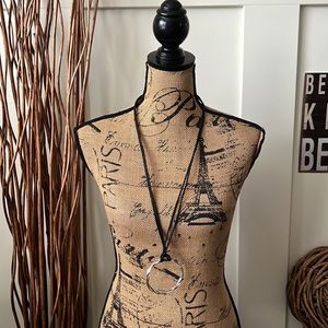 Cato Silver Tone Twisted Circular Pendant Necklace On Black Rope